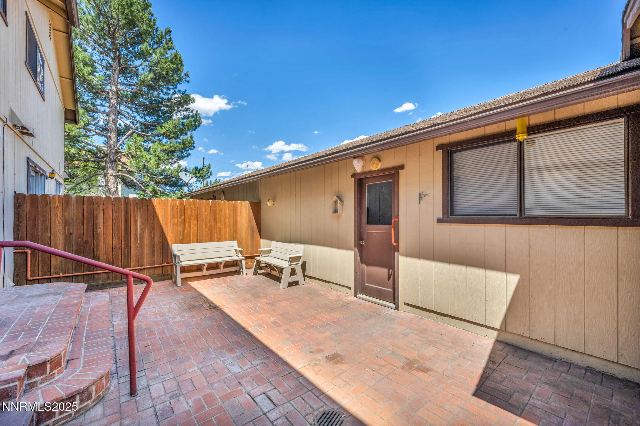 1481 Foster Drive Reno, NV 89509 - Photo 23 of 52 a backyard of a house with table and chairs