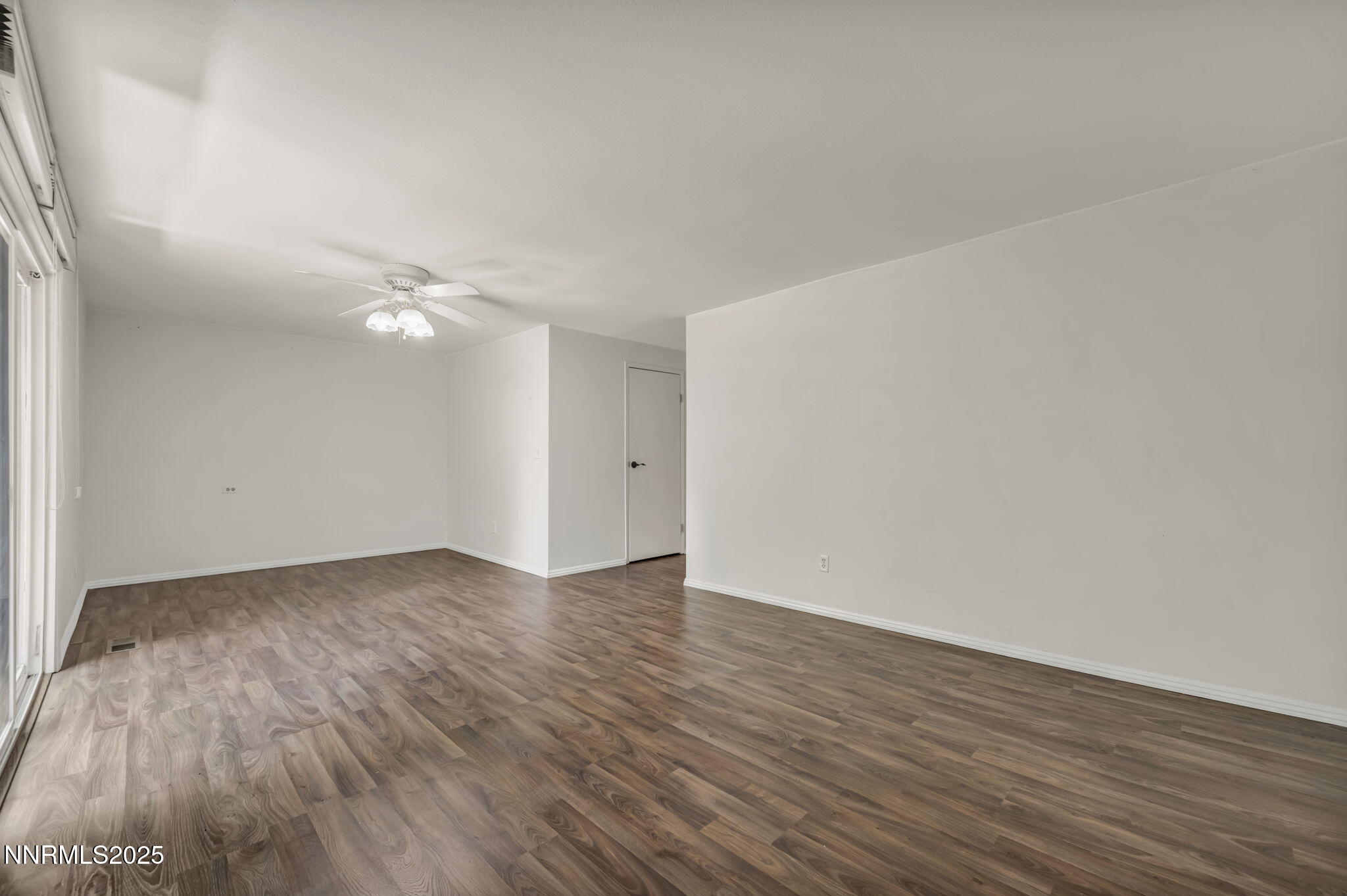 1481 Foster Drive Reno, NV 89509 - Photo 29 of 52 a view of an empty room with wooden floor