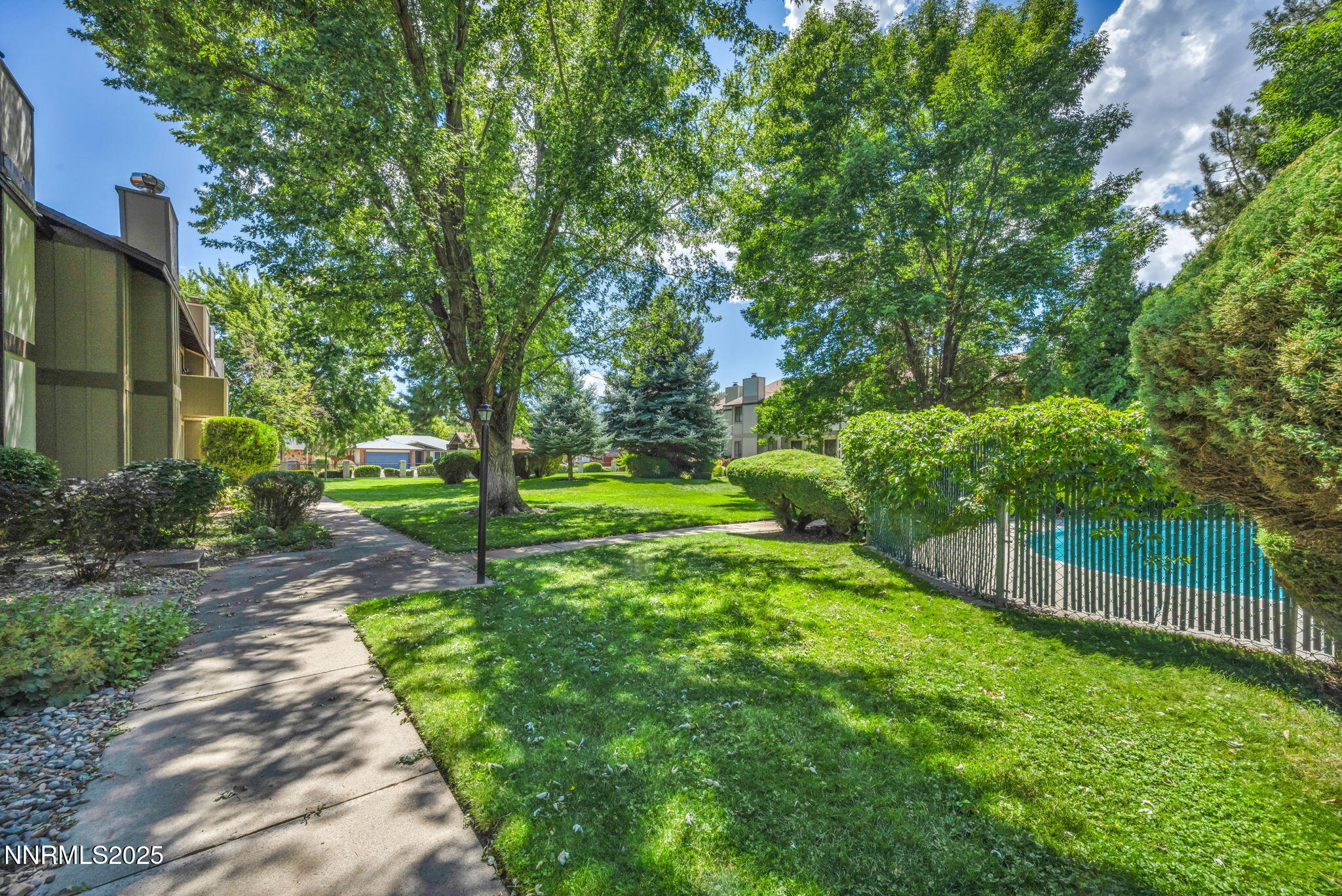 1481 Foster Drive Reno, NV 89509 - Photo 36 of 52 a view of a backyard with a garden