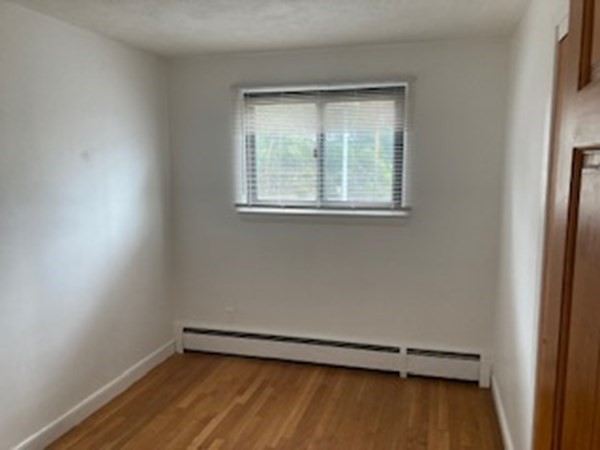 2 Winthrop Street, Unit 3 Watertown, MA 02472 - Photo 5 of 8 an empty room with a window