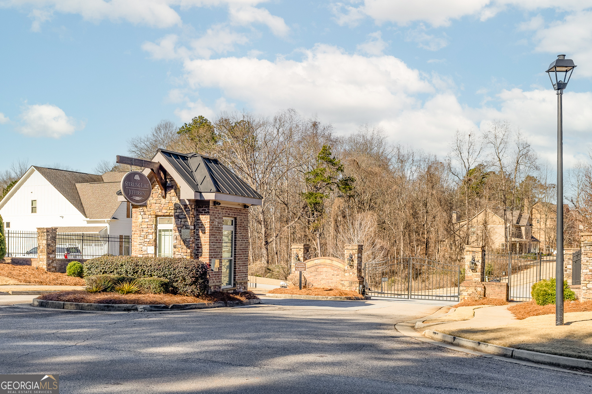 56 Creek Side Court Jefferson, GA 30549 - Photo 2 of 46 a front view of a house with a yard