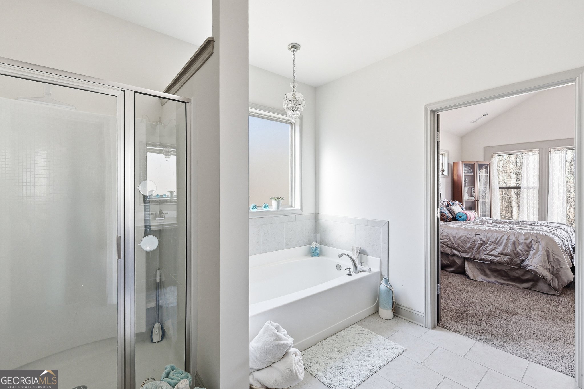 56 Creek Side Court Jefferson, GA 30549 - Photo 26 of 46 a bathroom with a tub shower and sink