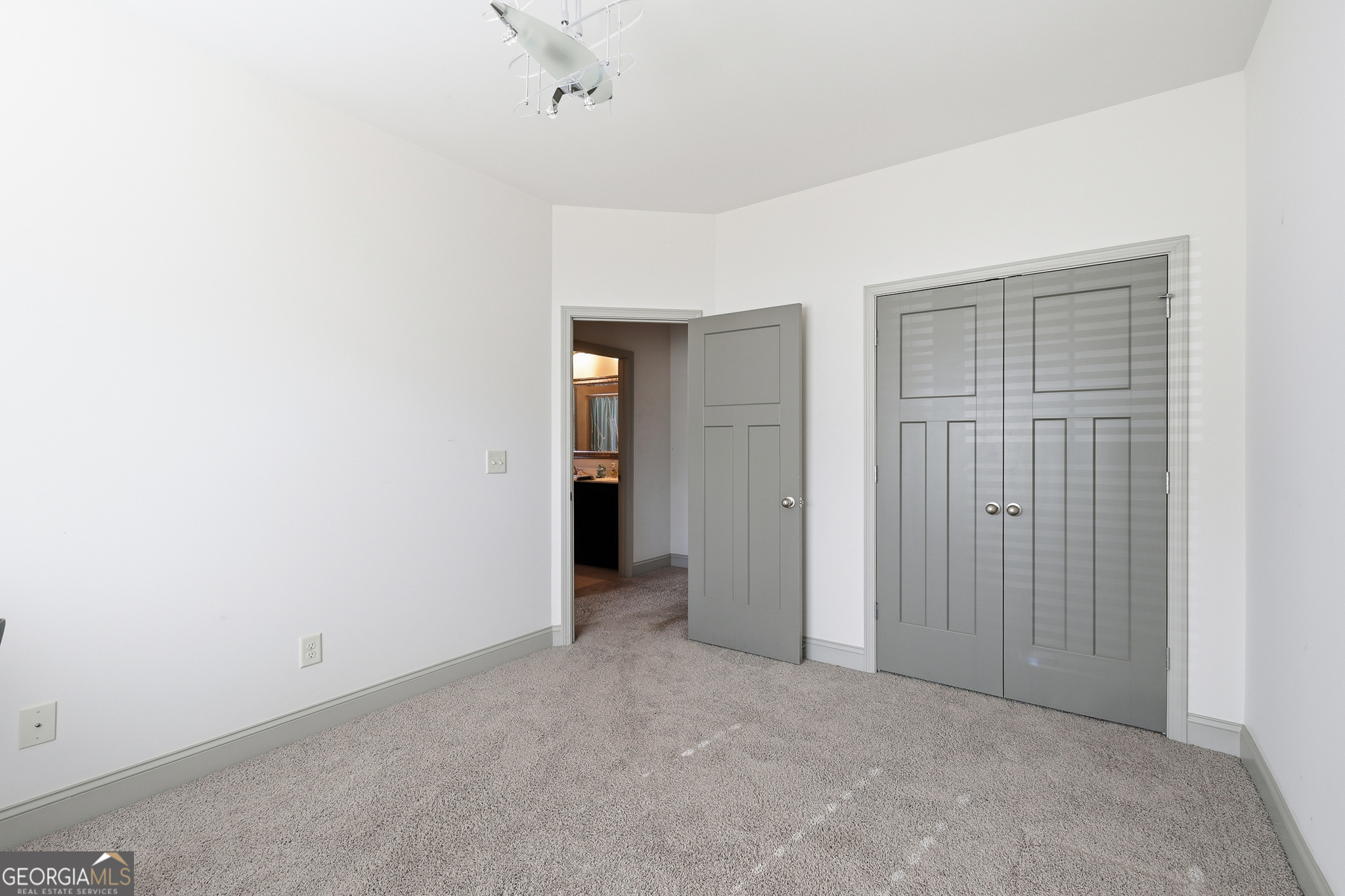 56 Creek Side Court Jefferson, GA 30549 - Photo 32 of 46 an empty room with closet