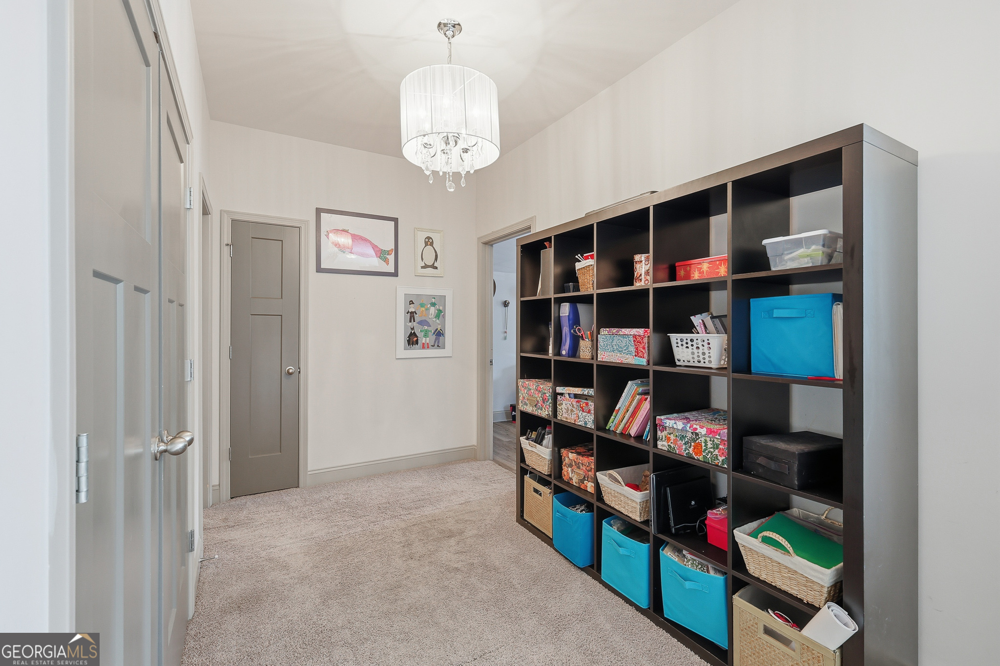 56 Creek Side Court Jefferson, GA 30549 - Photo 36 of 46 a view of a book shelf with lots of books