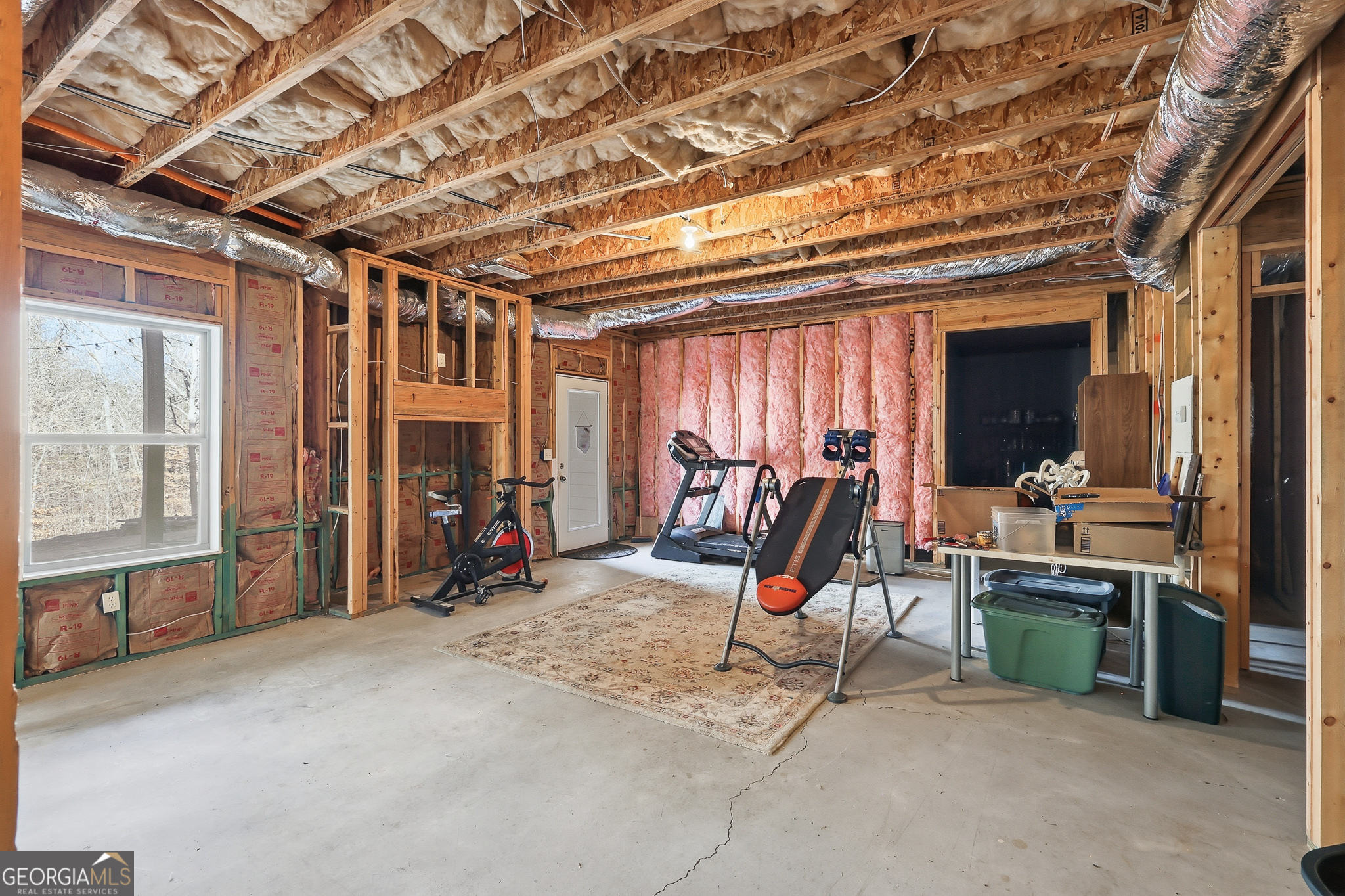 56 Creek Side Court Jefferson, GA 30549 - Photo 42 of 46 a view of a room with gym equipment