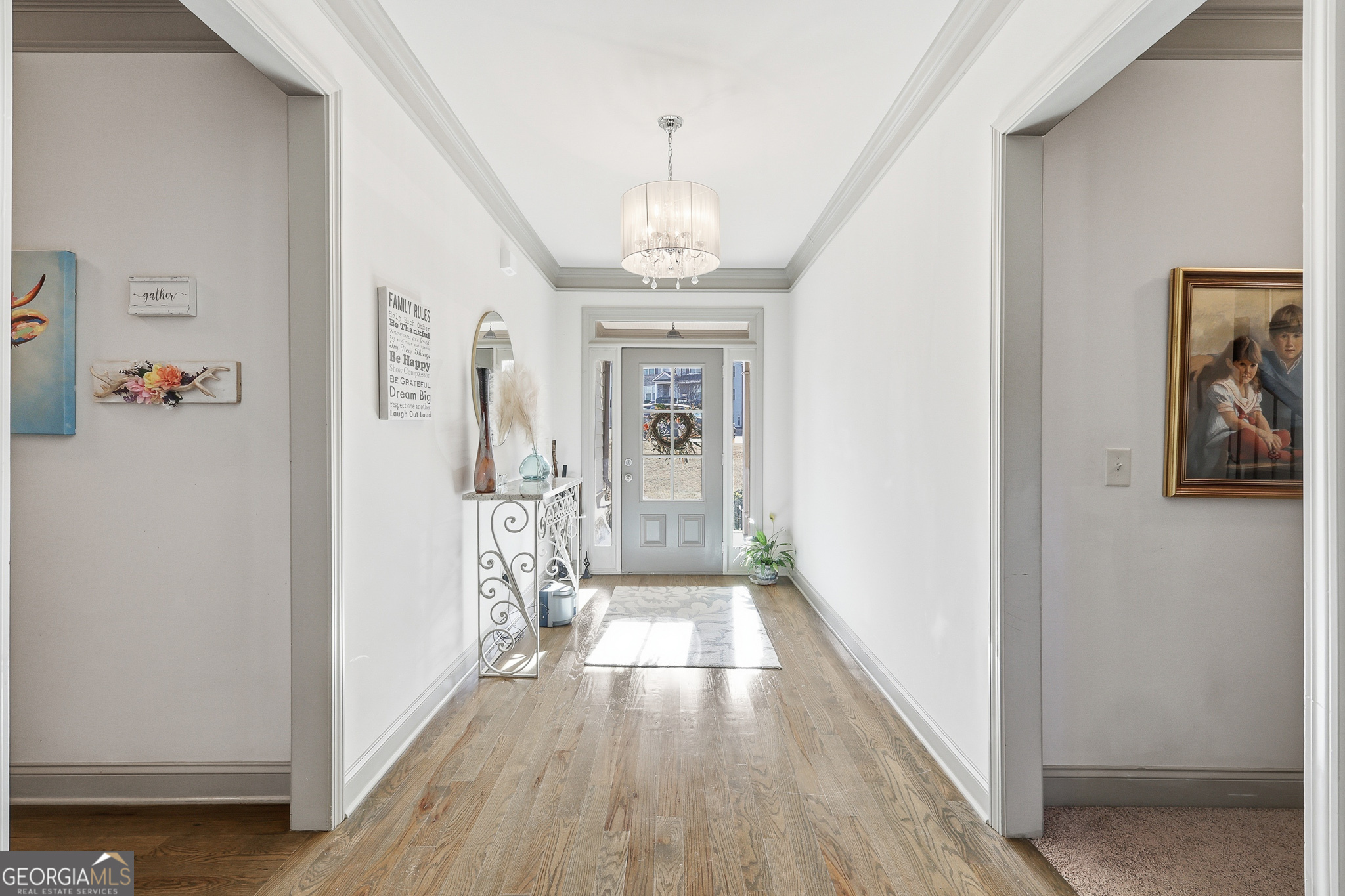 56 Creek Side Court Jefferson, GA 30549 - Photo 10 of 46 a view of a hallway view with wooden floor and staircase