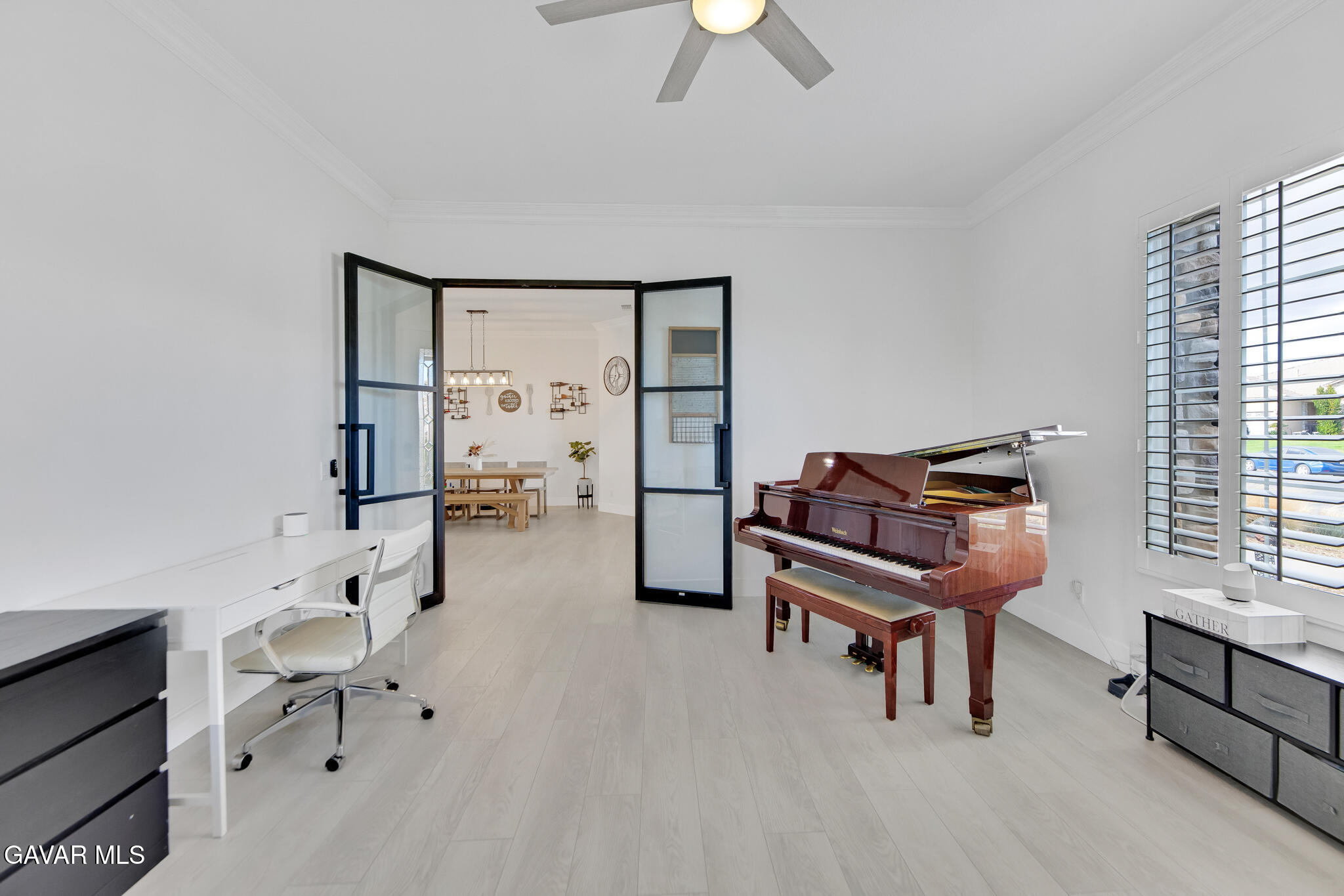 41632 Firenze Street Lancaster, CA 93536 - Photo 12 of 67 a living room with furniture and a piano