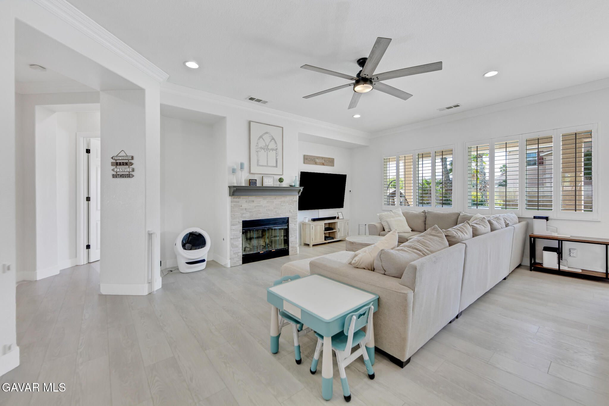 41632 Firenze Street Lancaster, CA 93536 - Photo 22 of 67 a living room with furniture fireplace and a window