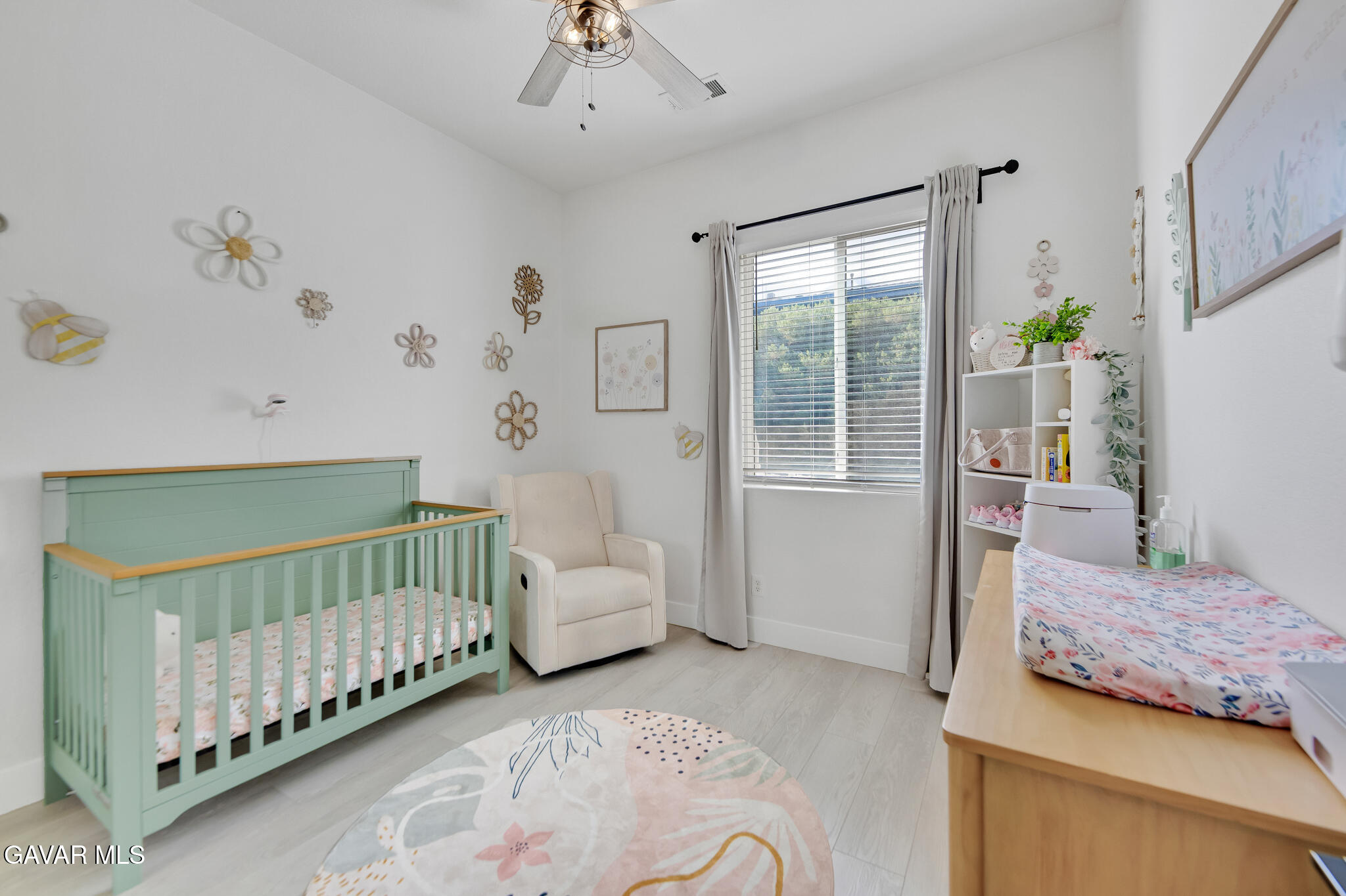 41632 Firenze Street Lancaster, CA 93536 - Photo 25 of 67 a bedroom with a bed and a window