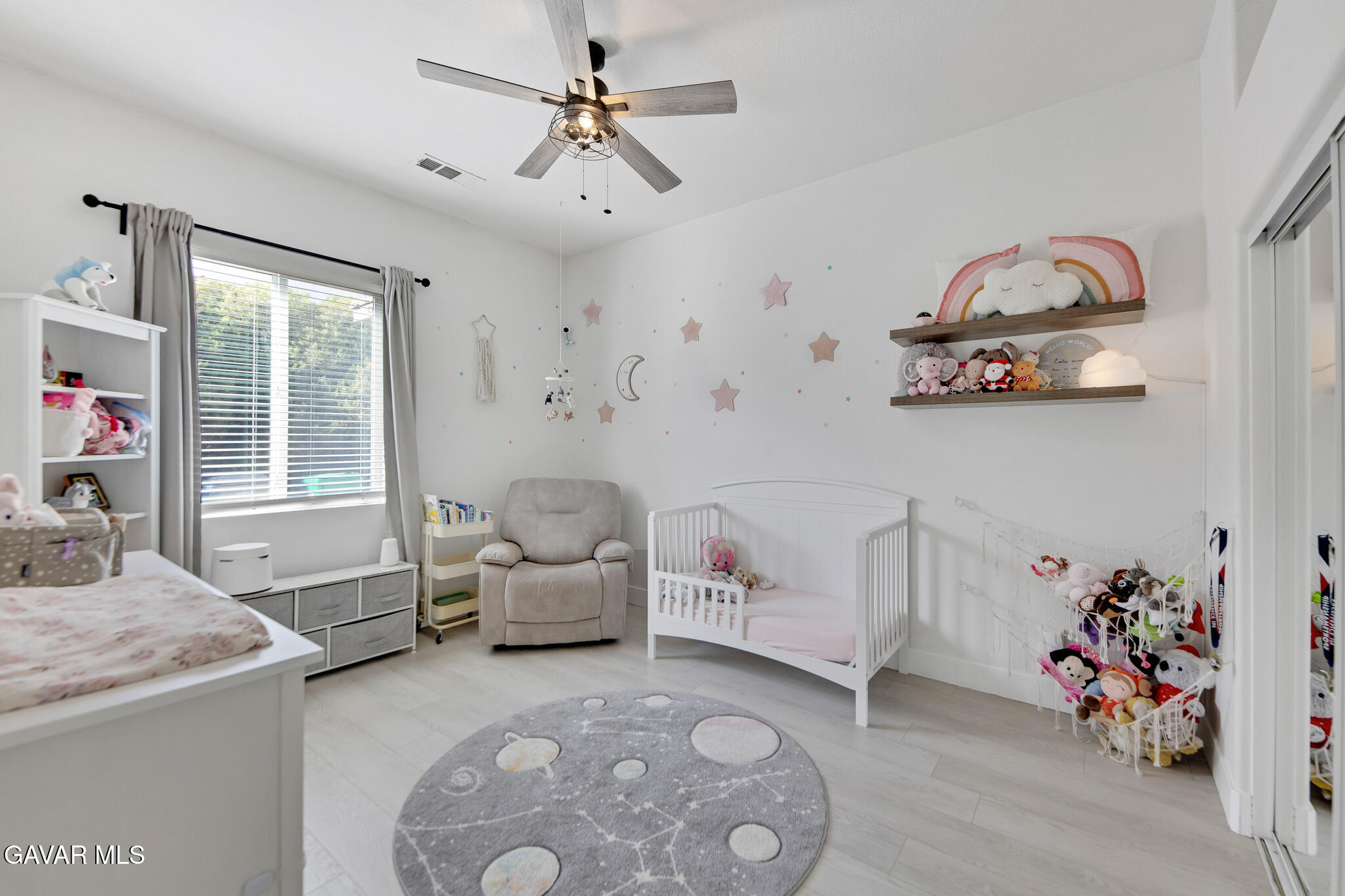 41632 Firenze Street Lancaster, CA 93536 - Photo 26 of 67 a bedroom with furniture and a window