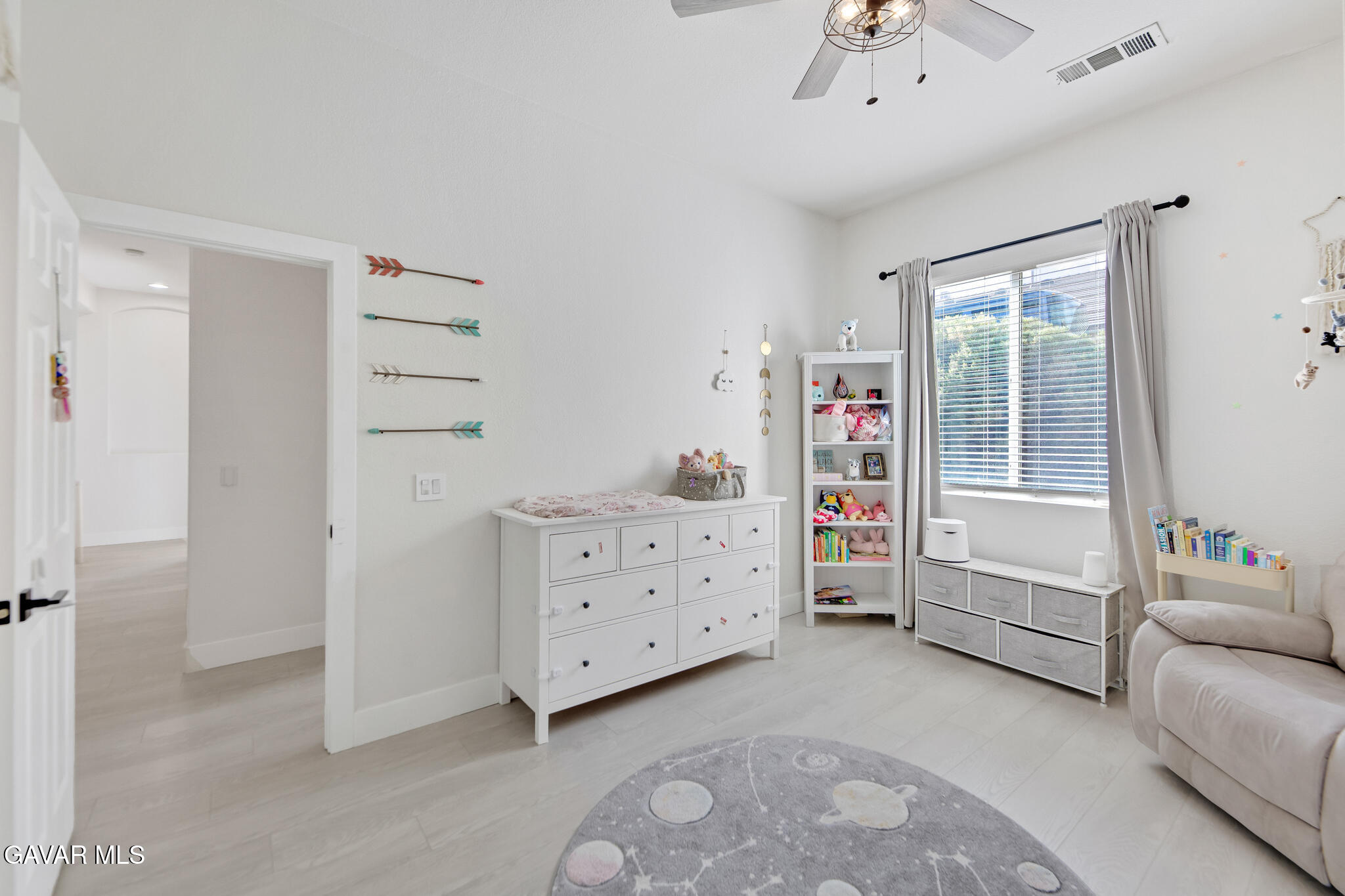 41632 Firenze Street Lancaster, CA 93536 - Photo 27 of 67 a room with furniture and window