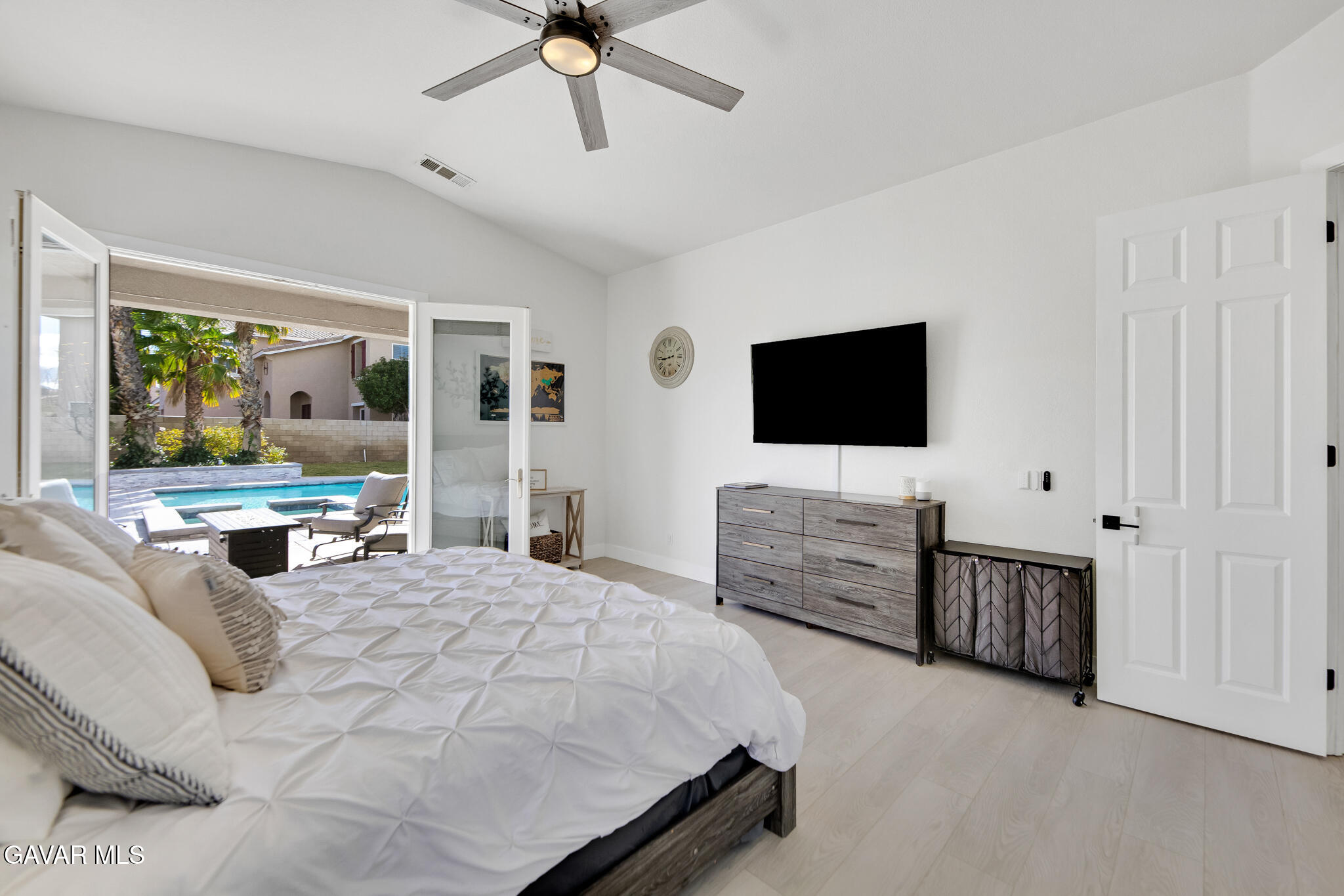 41632 Firenze Street Lancaster, CA 93536 - Photo 30 of 67 a bedroom with furniture and flat screen tv