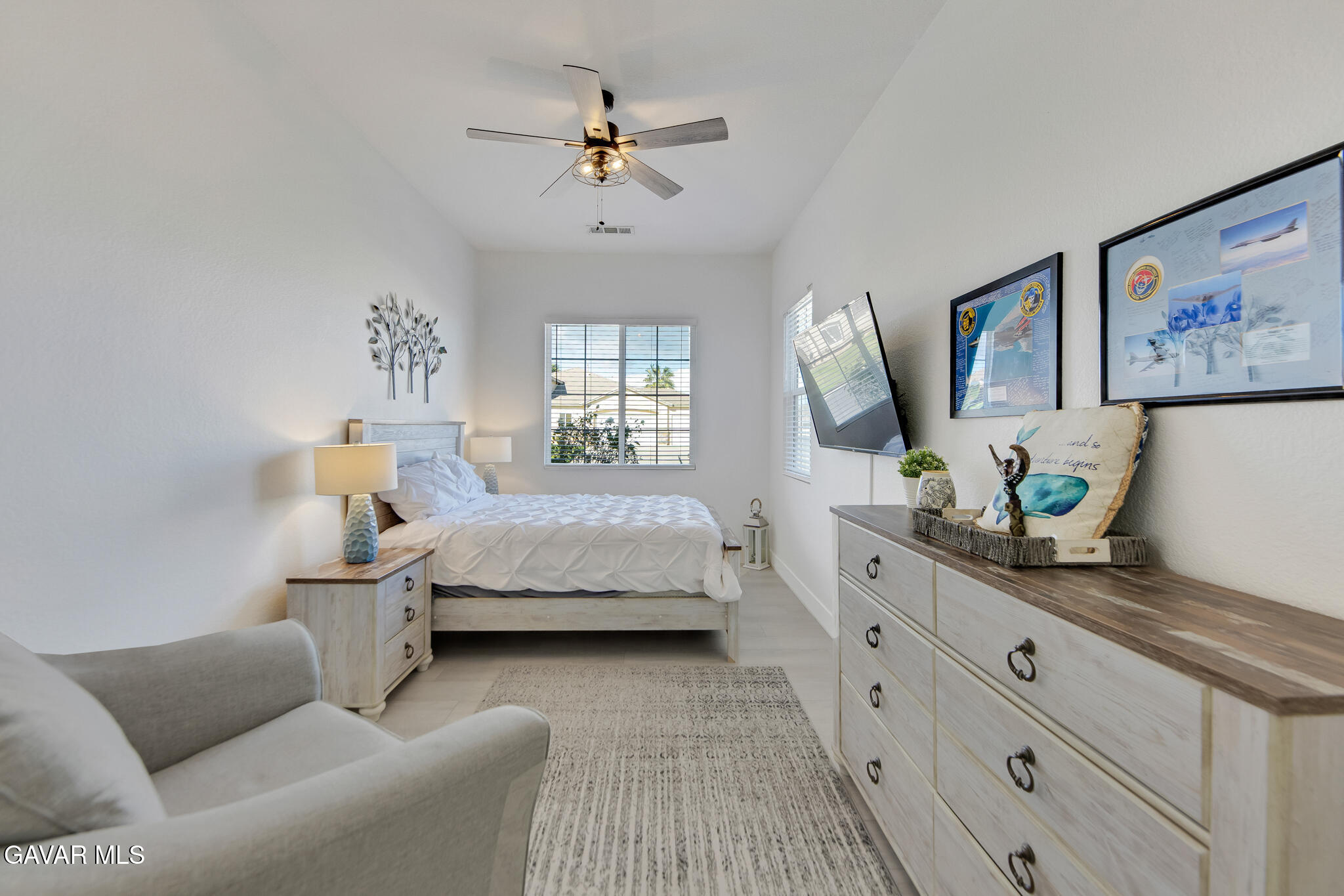 41632 Firenze Street Lancaster, CA 93536 - Photo 37 of 67 a bedroom with a bed furniture and window