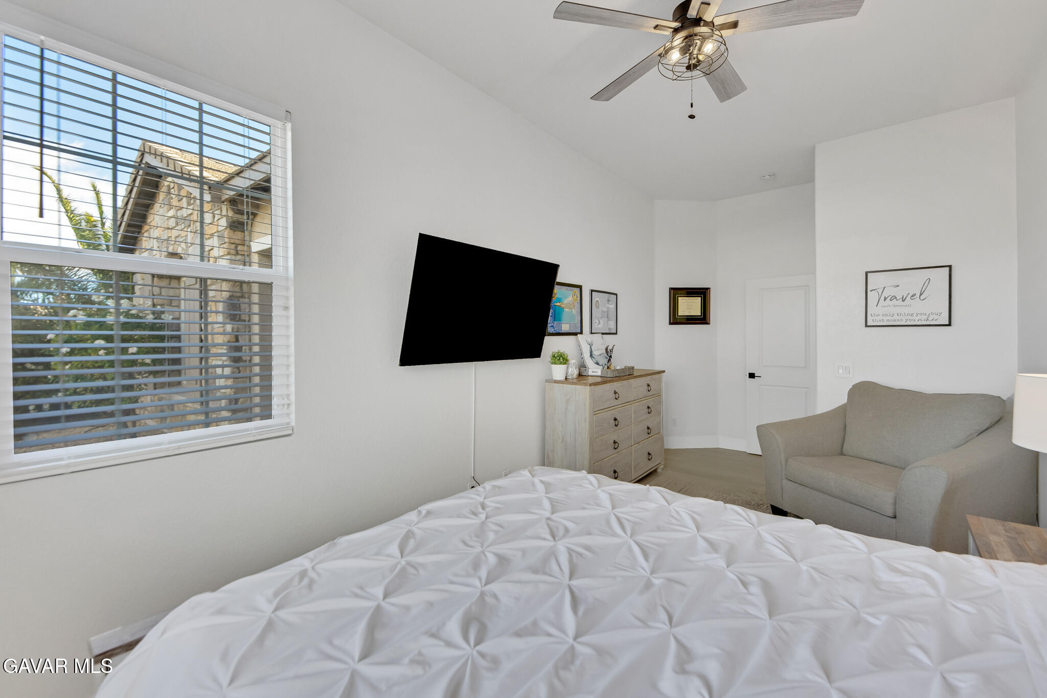 41632 Firenze Street Lancaster, CA 93536 - Photo 38 of 67 a bedroom with a bed window and a flat screen tv