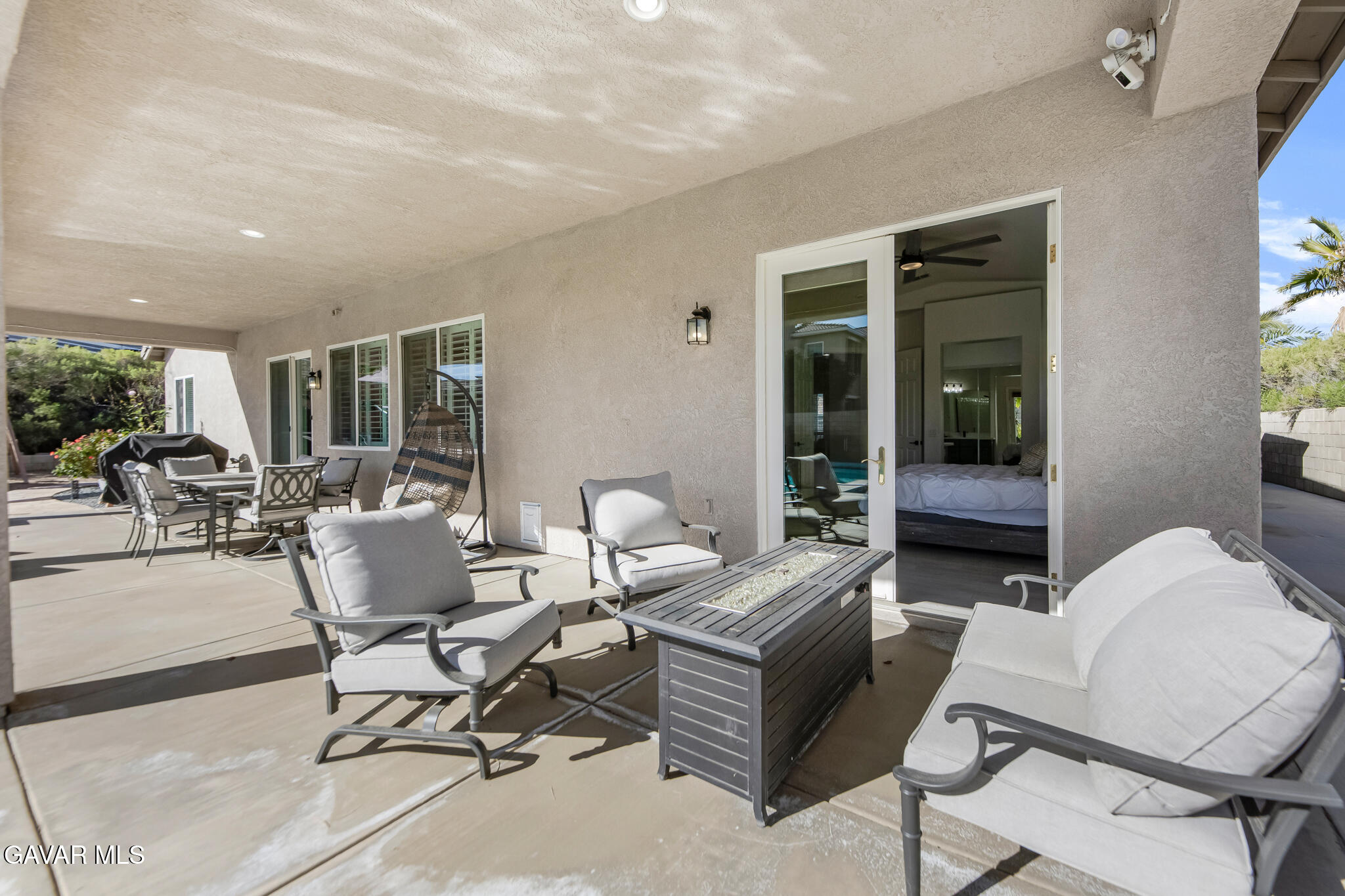 41632 Firenze Street Lancaster, CA 93536 - Photo 40 of 67 a living room with furniture and a potted plant