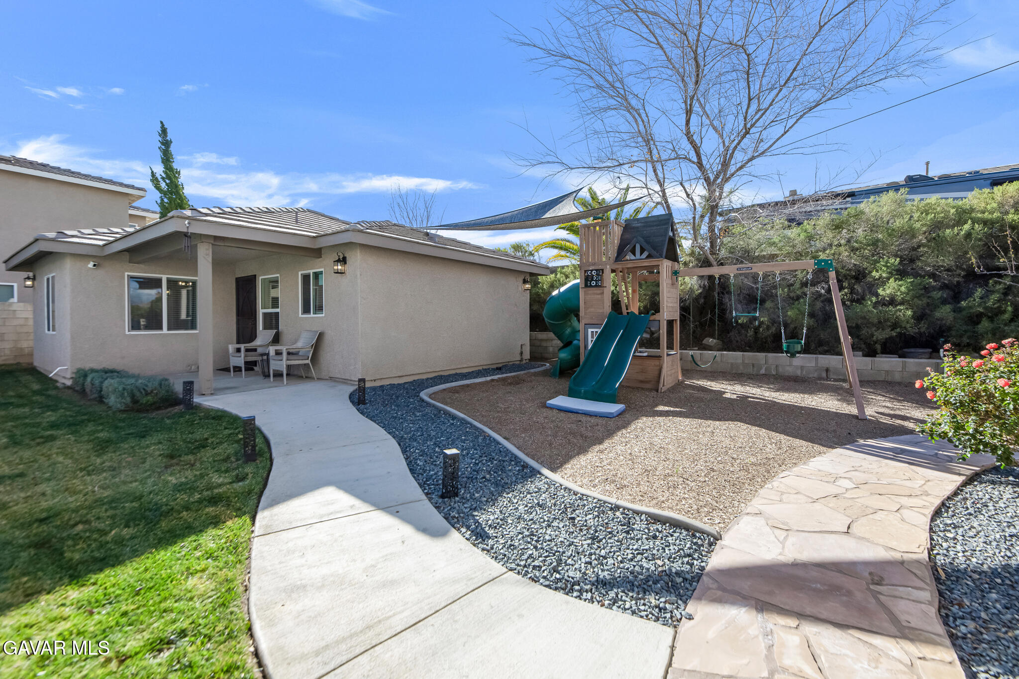 41632 Firenze Street Lancaster, CA 93536 - Photo 46 of 67 a front view of a house with a yard