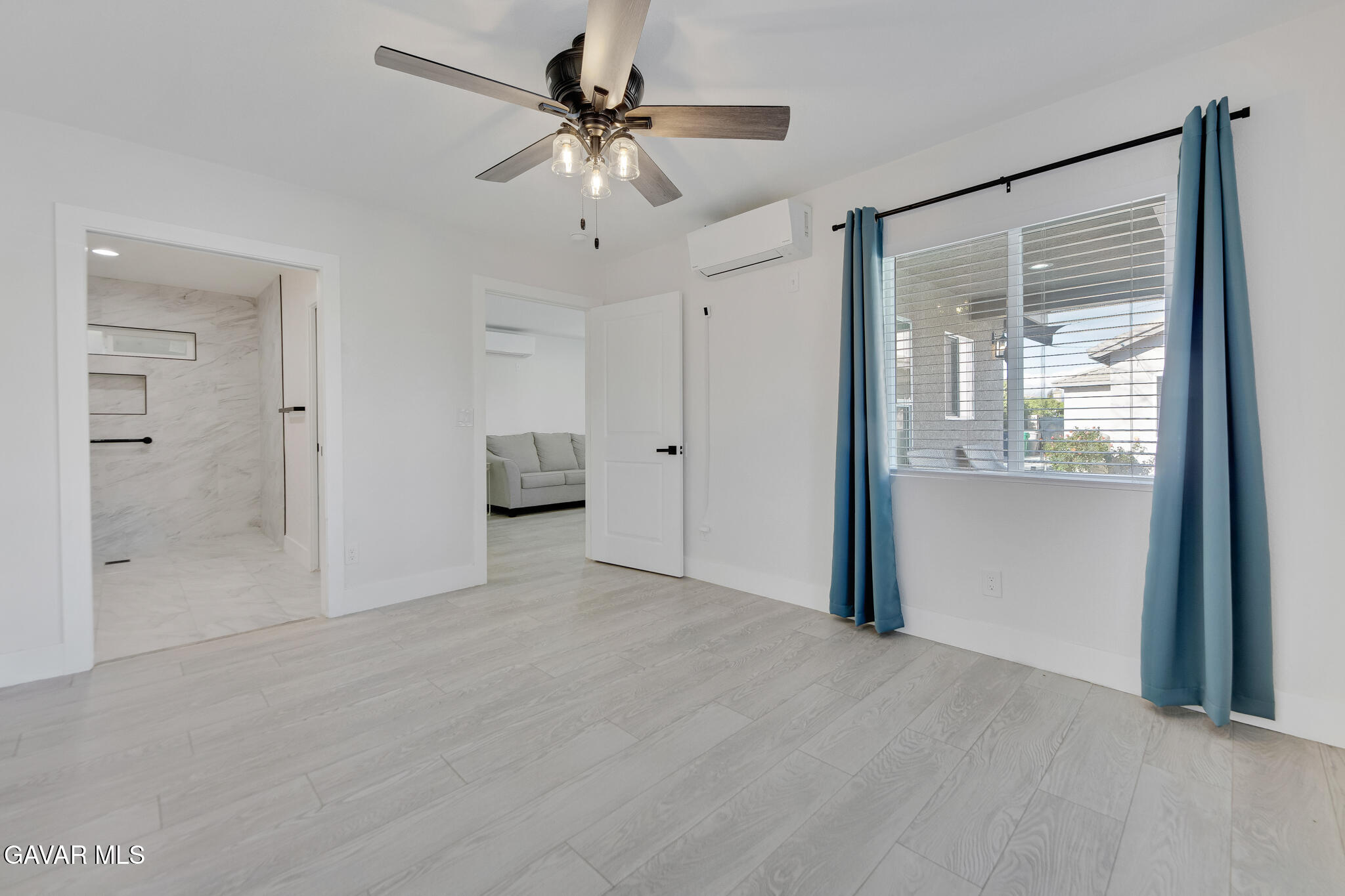 41632 Firenze Street Lancaster, CA 93536 - Photo 51 of 67 an empty room with fan and windows