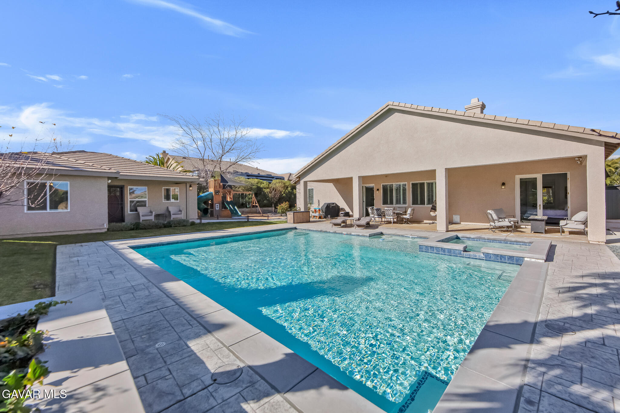 41632 Firenze Street Lancaster, CA 93536 - Photo 54 of 67 a front view of a house with garden