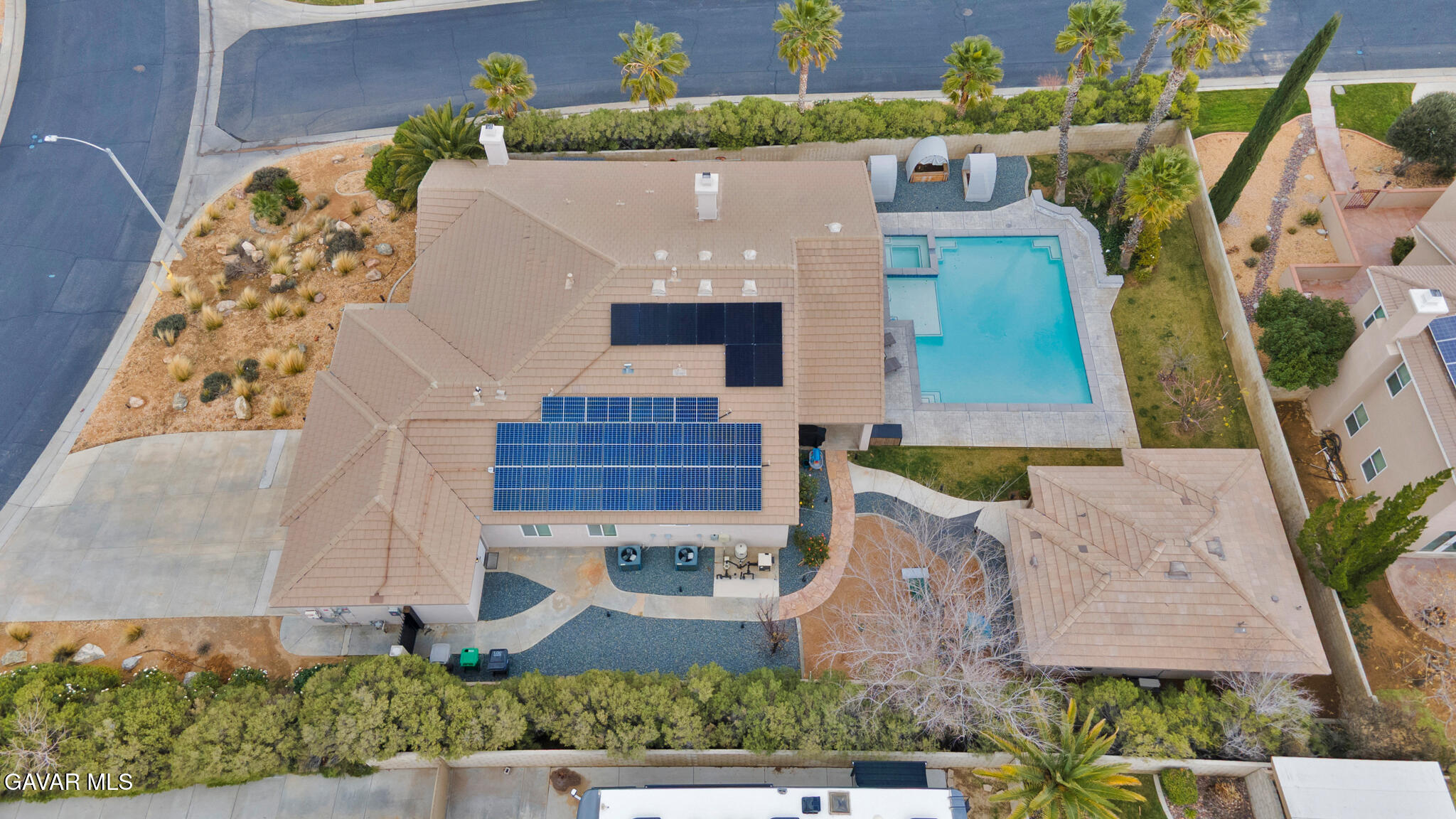 41632 Firenze Street Lancaster, CA 93536 - Photo 60 of 67 an aerial view of a house with a garden and trees