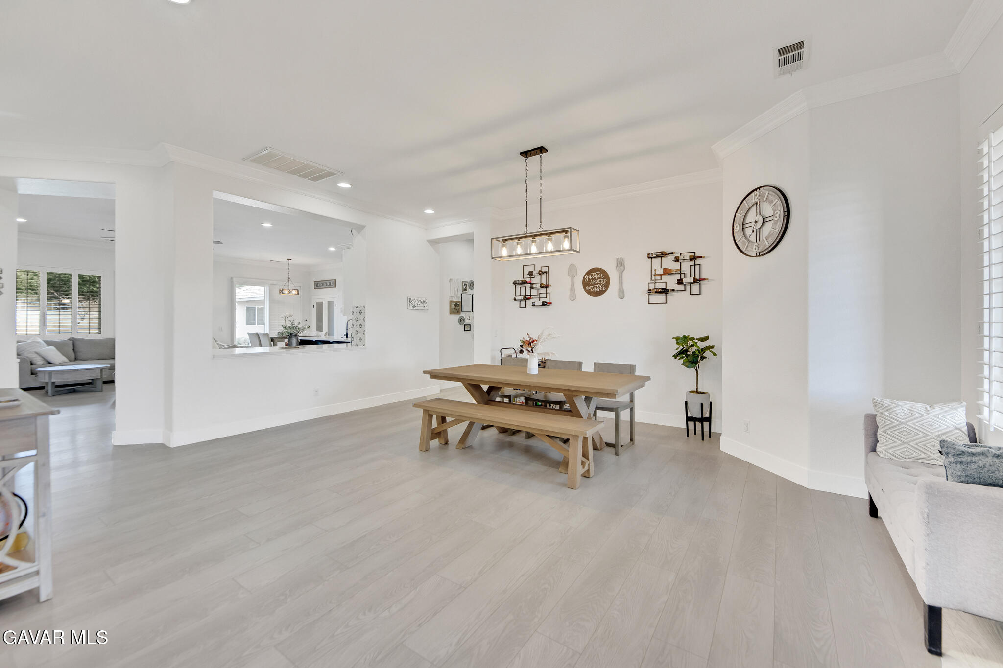 41632 Firenze Street Lancaster, CA 93536 - Photo 7 of 67 a living room with furniture and a table