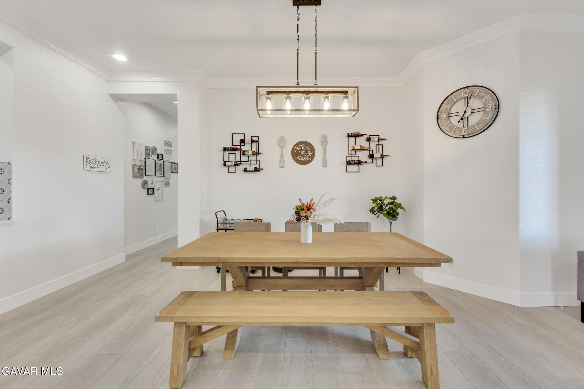 41632 Firenze Street Lancaster, CA 93536 - Photo 8 of 67 a view of a dining room with furniture and wooden floor