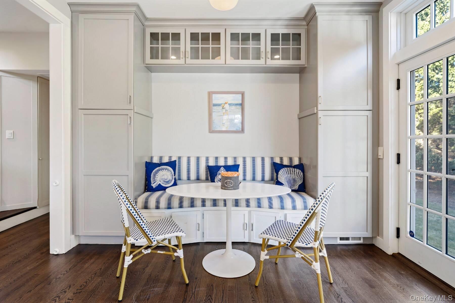 30 Exchange Place Westhampton Beach, NY 11978 - Photo 11 of 25 a view of a dining room with furniture and wooden floor