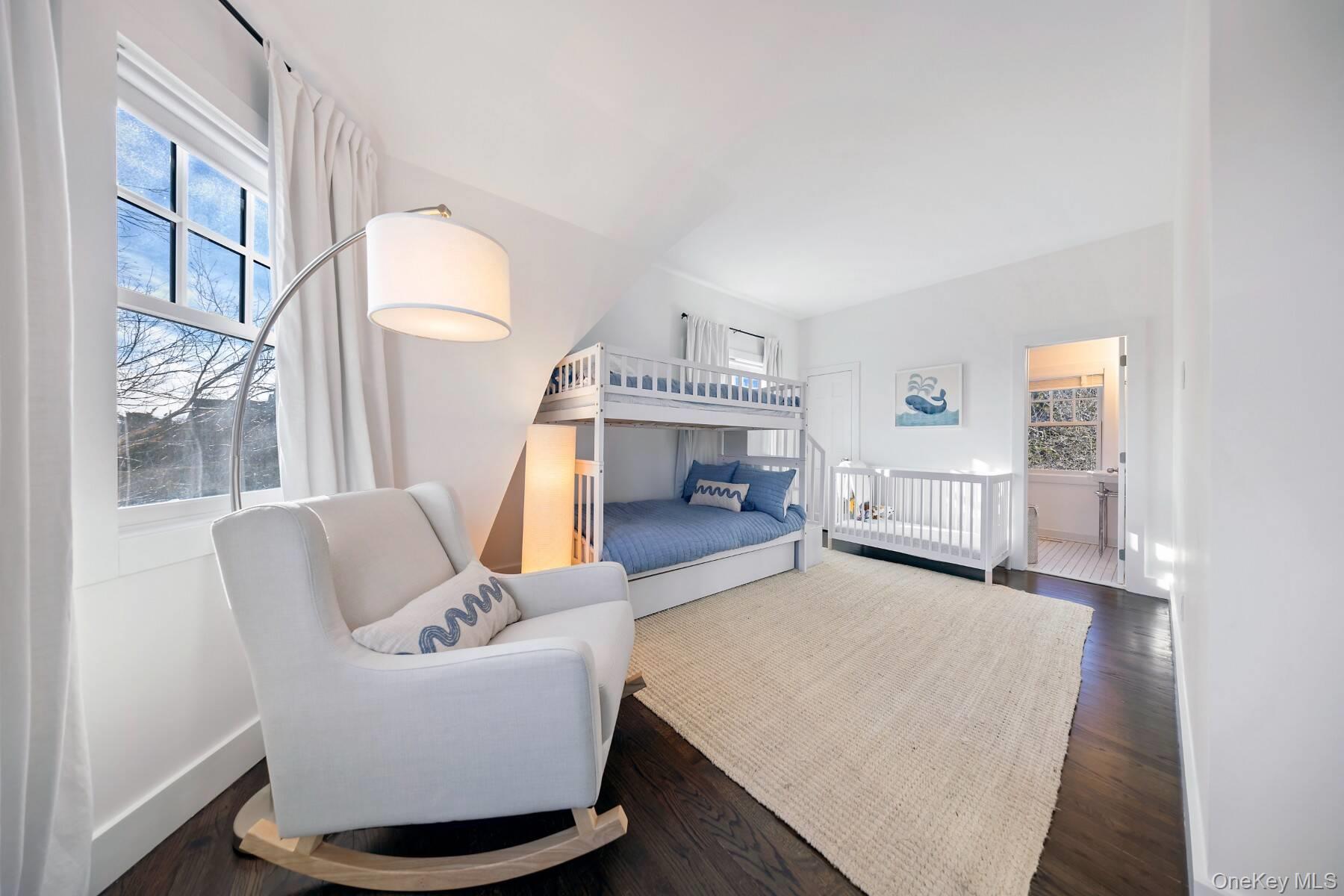 30 Exchange Place Westhampton Beach, NY 11978 - Photo 18 of 25 a living room with furniture and a fireplace