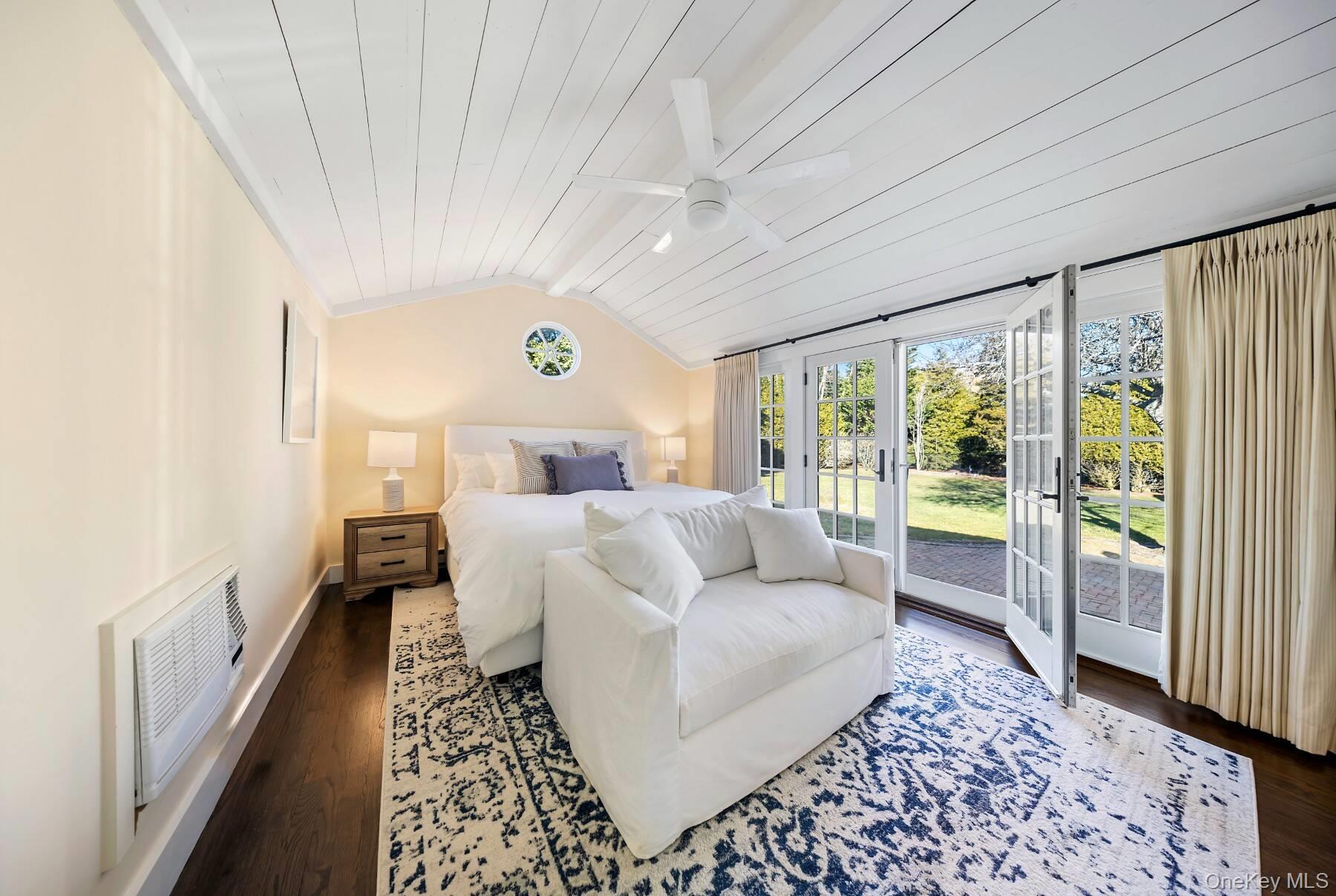 30 Exchange Place Westhampton Beach, NY 11978 - Photo 20 of 25 a living room with furniture and a large window