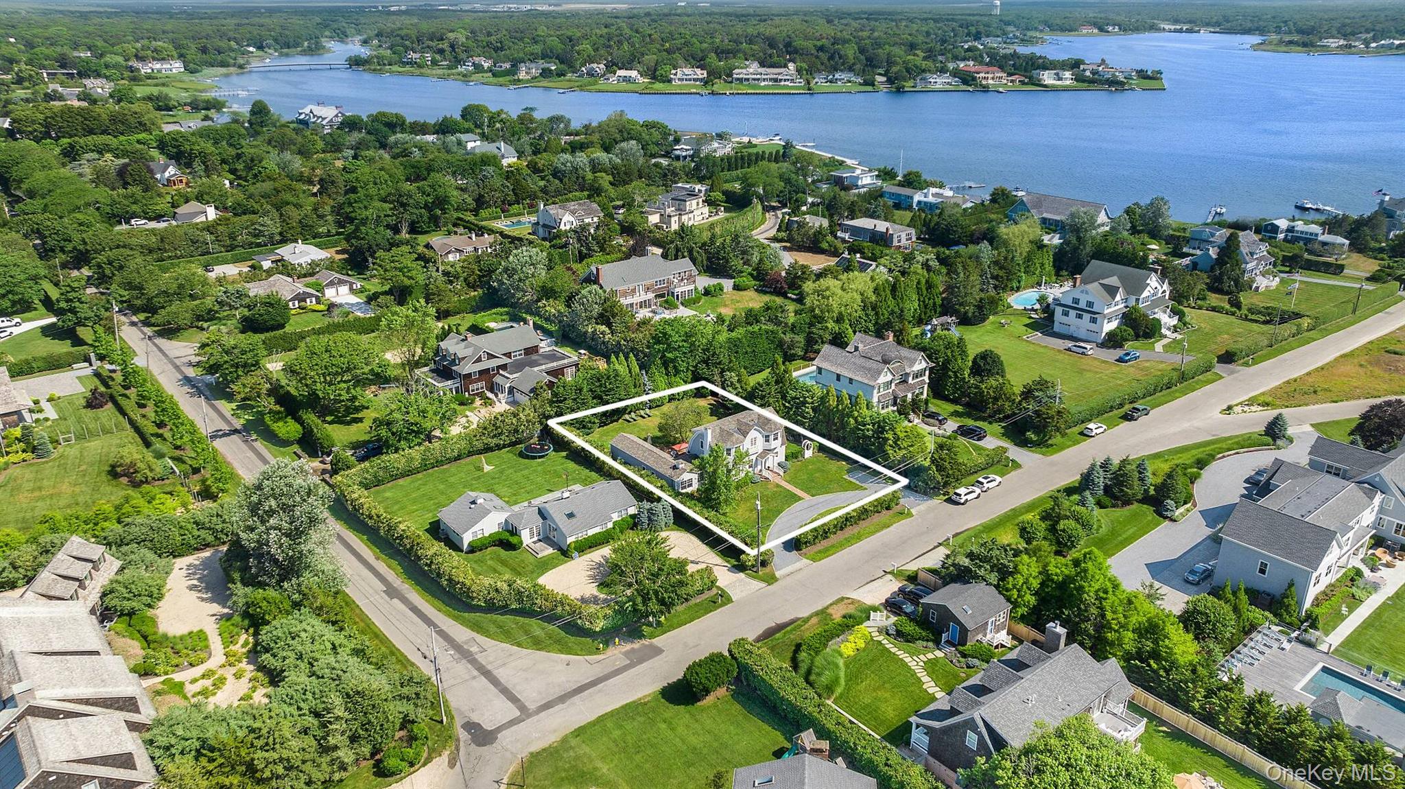 30 Exchange Place Westhampton Beach, NY 11978 - Photo 2 of 25 an aerial view of a residential houses with outdoor space and trees