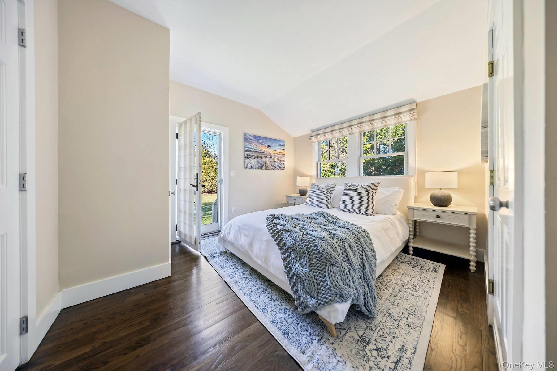 30 Exchange Place Westhampton Beach, NY 11978 - Photo 22 of 25 a bedroom with a bed and window