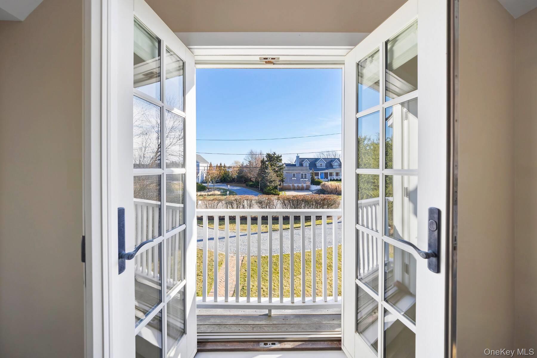 30 Exchange Place Westhampton Beach, NY 11978 - Photo 23 of 25 a view of staircase with a large window