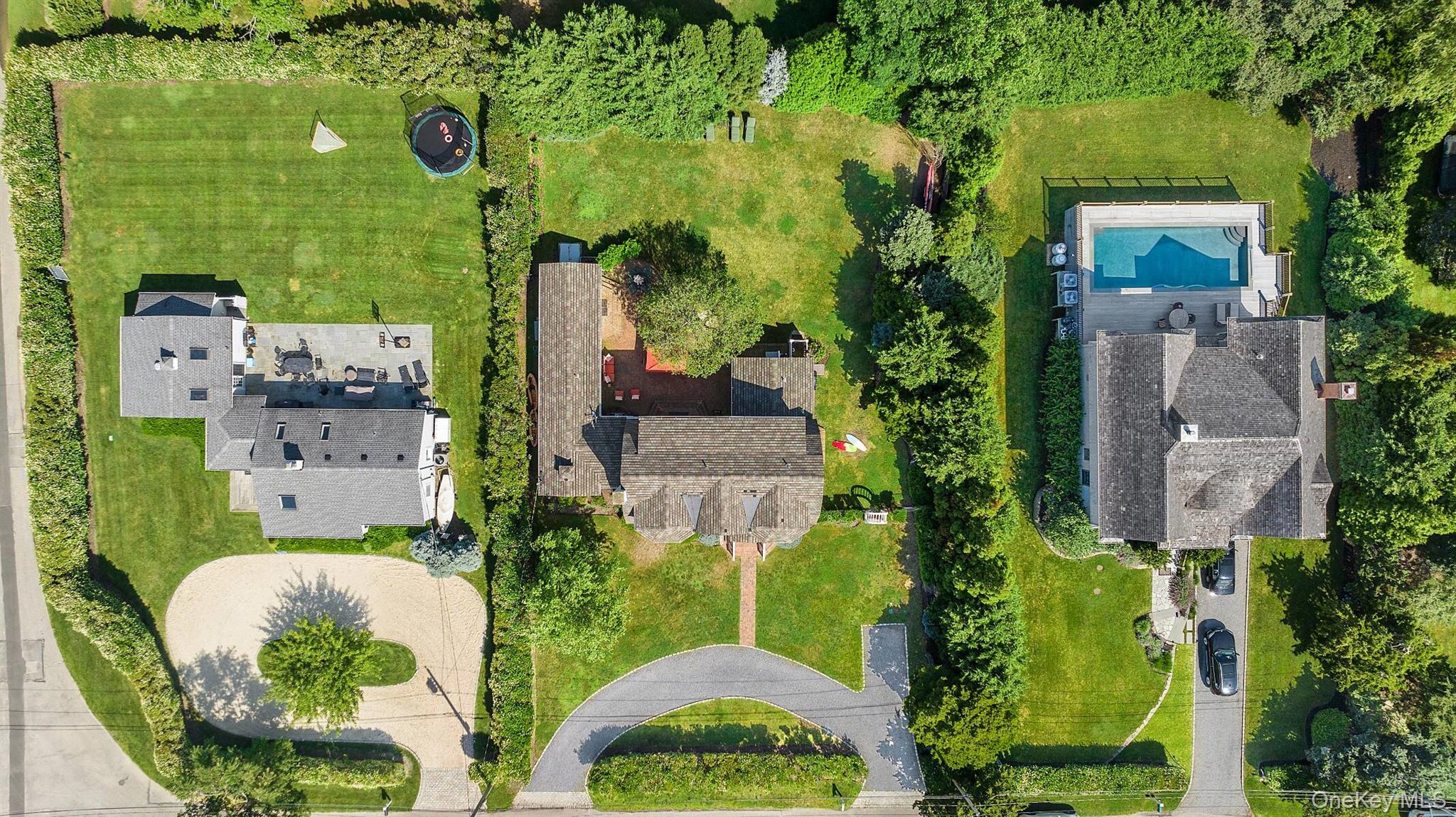 30 Exchange Place Westhampton Beach, NY 11978 - Photo 25 of 25 an aerial view of a house with outdoor space and a lake view