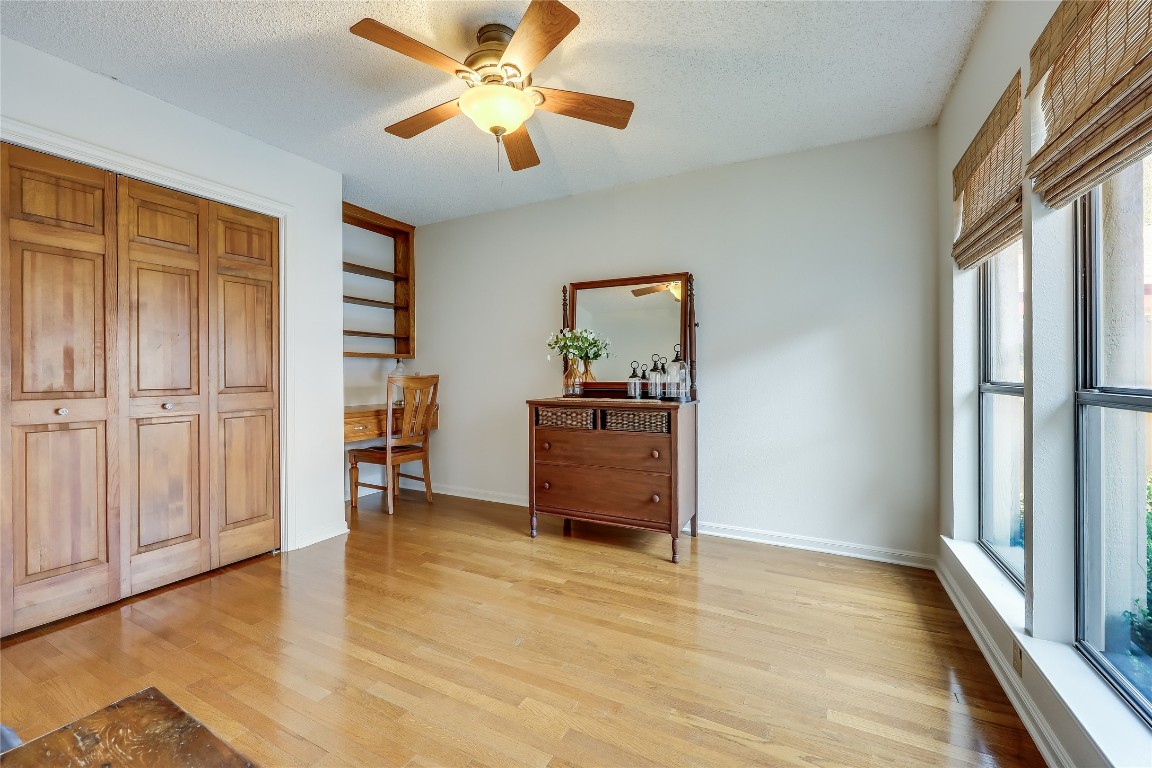 6015 Tonkowa Trail Georgetown, TX 78628 - Photo 19 of 40 wooden floor in an empty room with a window