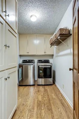 a kitchen with a stove and a refrigerator