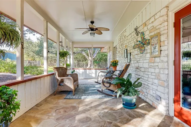 a view of a patio with furniture