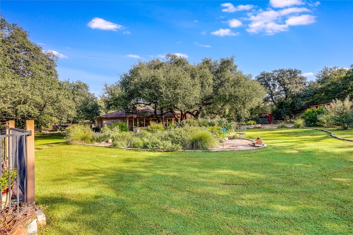 6015 Tonkowa Trail Georgetown, TX 78628 - Photo 31 of 40 a view of swimming pool with an outdoor space and seating area