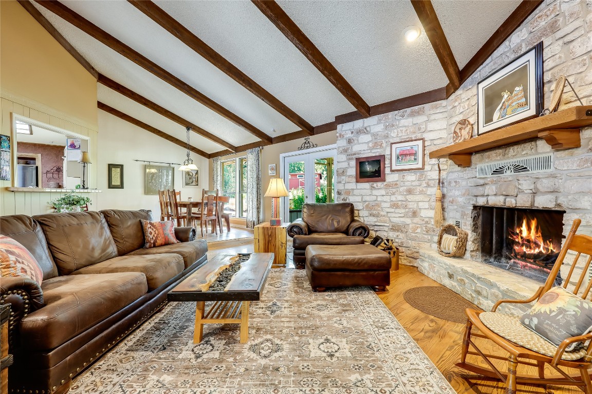 6015 Tonkowa Trail Georgetown, TX 78628 - Photo 6 of 40 a living room with furniture and a fireplace