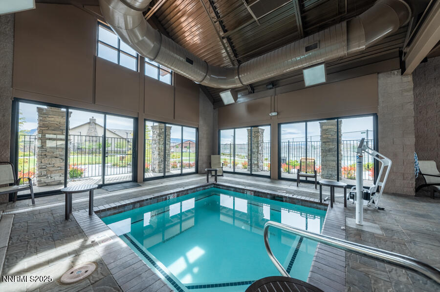 2300 Brego Lane Reno, NV 89521 - Photo 54 of 69 a indoor swimming pool with view of living room