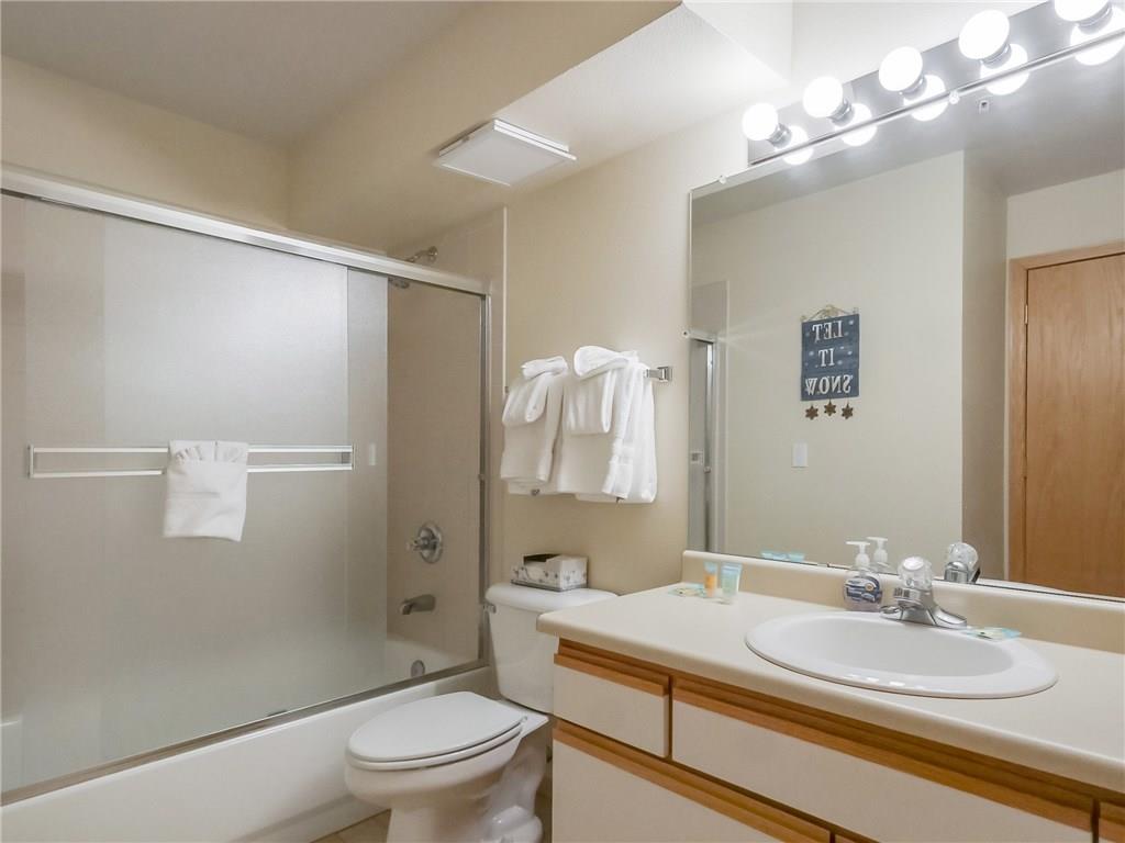 72 Oro Grande Road, Unit 212 Keystone, CO 80435 - Photo 12 of 21 a bathroom with a sink a toilet and shower
