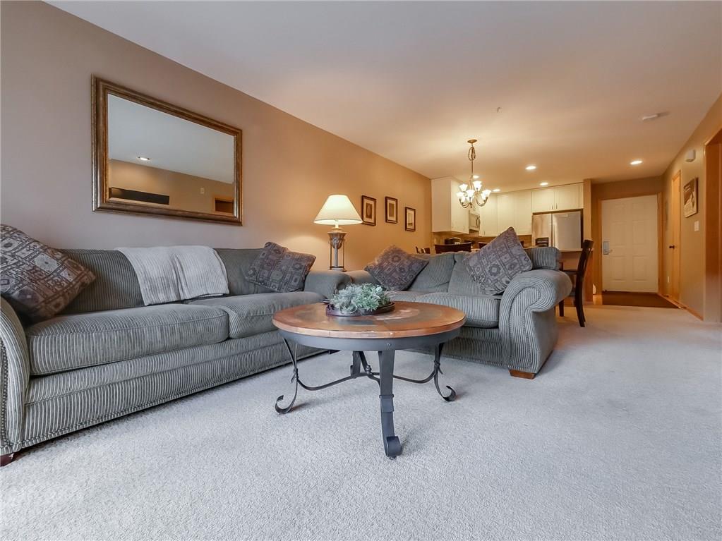 72 Oro Grande Road, Unit 212 Keystone, CO 80435 - Photo 17 of 21 a living room with furniture and a table
