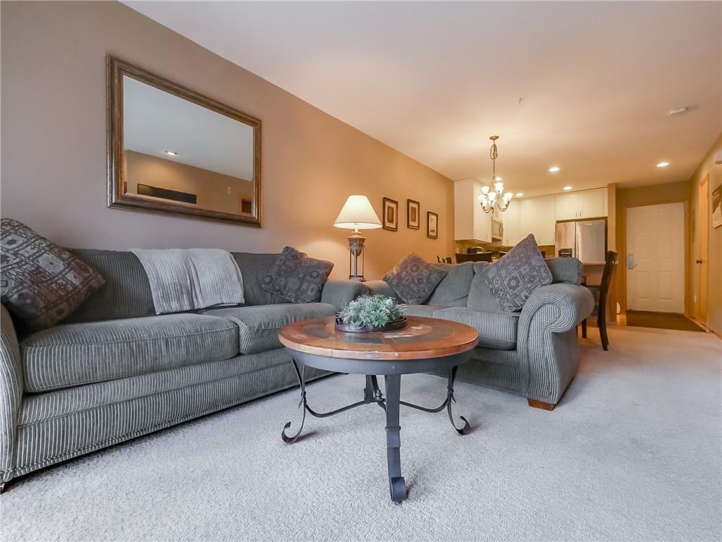 72 Oro Grande Road, Unit 212 Keystone, CO 80435 - Photo 19 of 21 a living room with furniture and a lamp