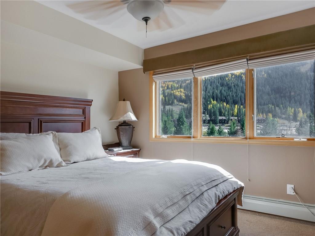 72 Oro Grande Road, Unit 212 Keystone, CO 80435 - Photo 20 of 21 a bedroom with a bed and window