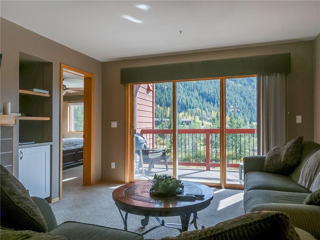 72 Oro Grande Road, Unit 212 Keystone, CO 80435 - Photo 4 of 21 a living room with furniture and a large window