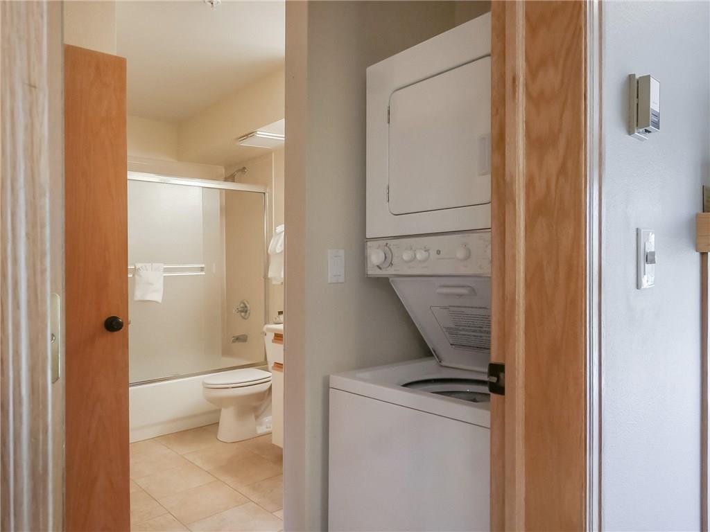 72 Oro Grande Road, Unit 212 Keystone, CO 80435 - Photo 10 of 21 a view of bathroom with a toilet sink and a mirror