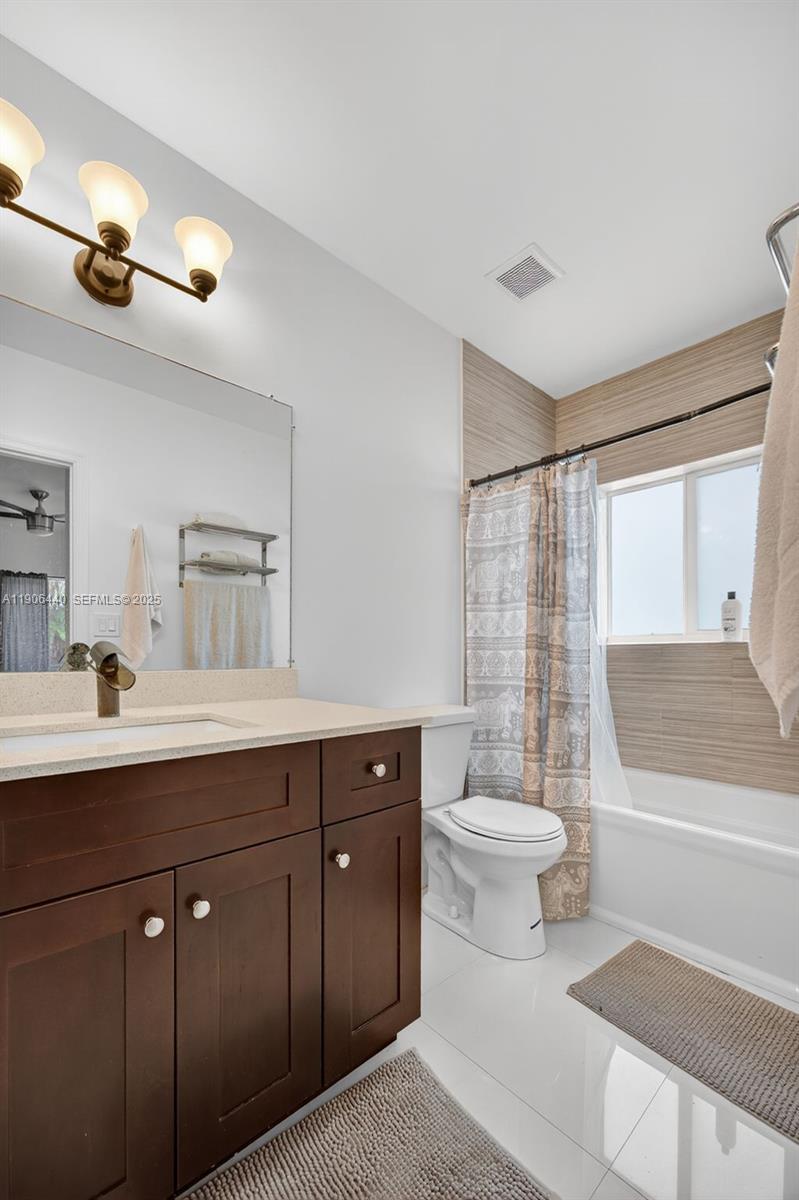 344 Southwest 3rd Street Florida City, FL 33034 - Photo 19 of 35 a bathroom with a sink toilet and shower