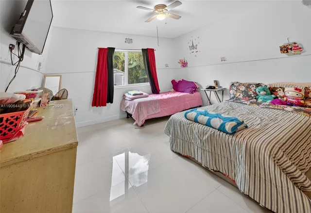 a bedroom with furniture and a bed