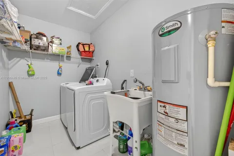 a utility room with dryer and washer
