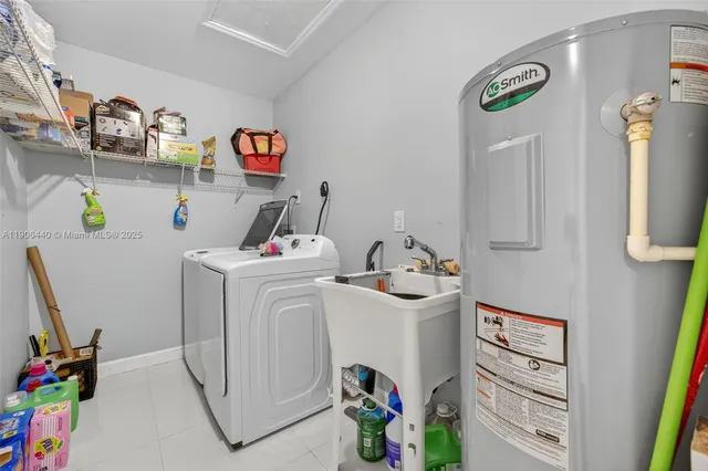 a utility room with dryer and washer
