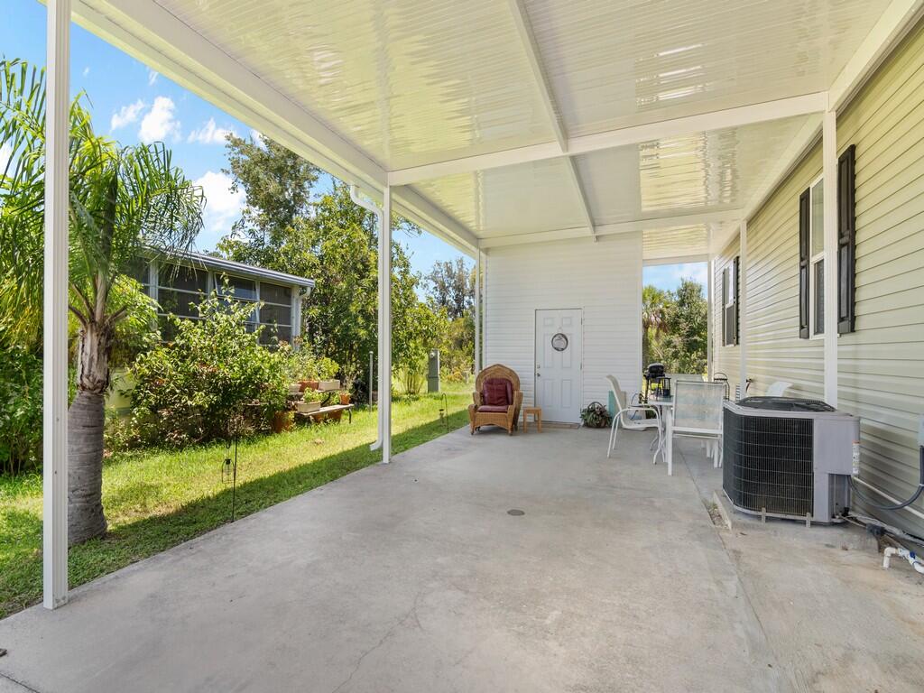 309 Mockingbird Avenue Fort Pierce, FL 34982 - Photo 15 of 22 Carport