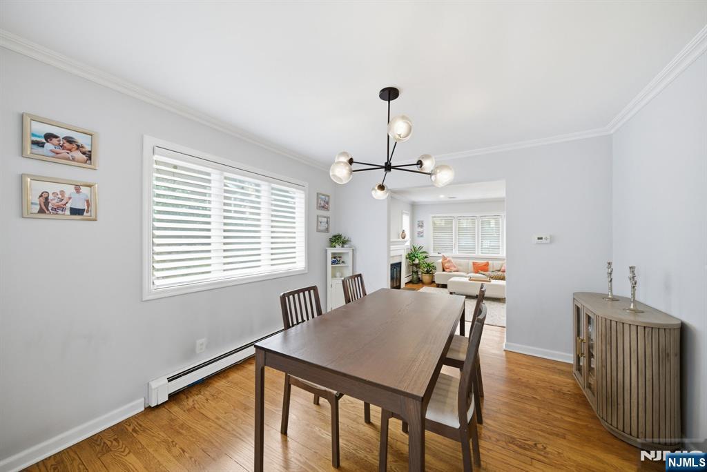 126 Sussex Road Tenafly, NJ 07670 - Photo 22 of 50 a view of a dining room with furniture window and wooden floor